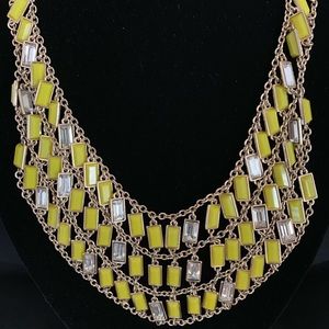 Gold rhinestone and resin stone necklace.